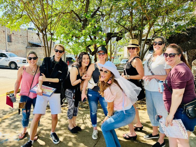 Employees playing Escape the Box, an outdoor escape game, in Austin, TX