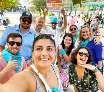 Employees playing Escape the Box, an outdoor escape game, in Austin, TX